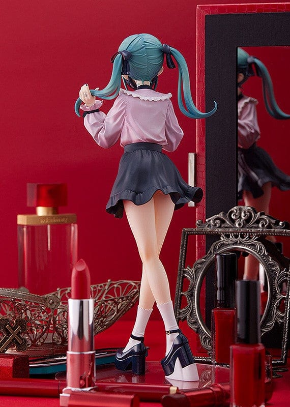 Vocaloid Pop Up Parade L Hatsune Miku The Vampire Ver. featuring Miku in a gothic pink and black outfit with twin pigtails and a mischievous smile.