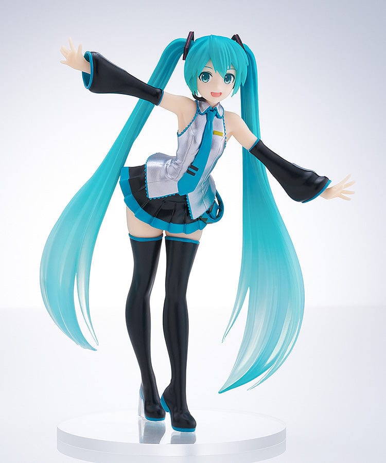 Vocaloid Pop Up Parade Miku Hatsune in a translucent color version, with her iconic turquoise twintails and a cheerful expression. She is dressed in her signature outfit, modified with translucent elements that give her a luminous and ethereal appearance.