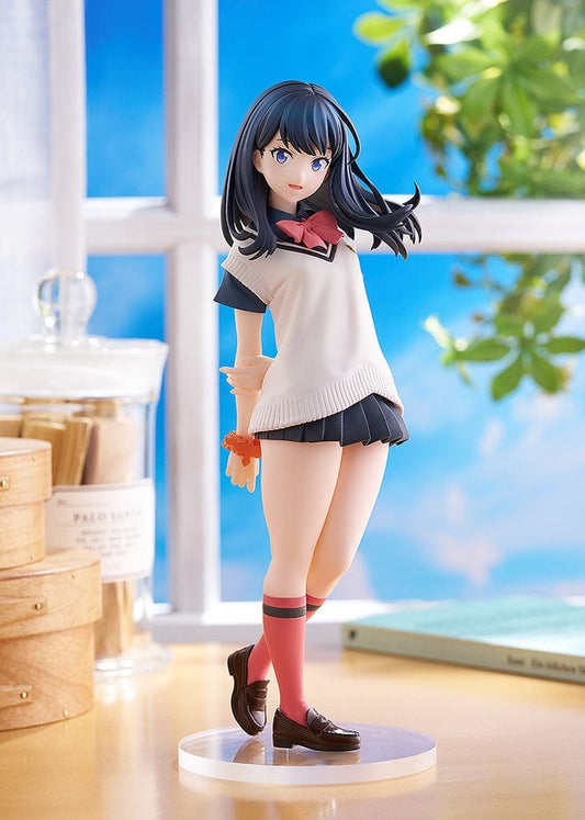 SSSS.Gridman Pop Up Parade Rikka Takarada figure, capturing her thoughtful expression and classic schoolgirl outfit with dark hair, blue eyes, and a red accessory on her wrist, embodying the character's blend of everyday normalcy and digital adventure.