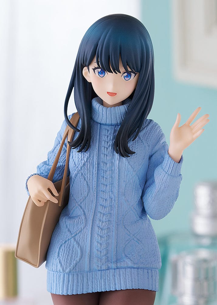 Gridman Universe POP UP PARADE L Rikka Takarada (Date Style Ver.) Figure, wearing a blue sweater dress with brown tights and holding a tan bag.