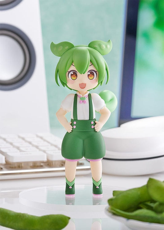 Vocaloid Pop Up Parade Zundamon figurine, with bright green hair and bows, wearing a white puffy-sleeved blouse, green shorts with pink accents, and matching boots, radiating a cheerful presence.