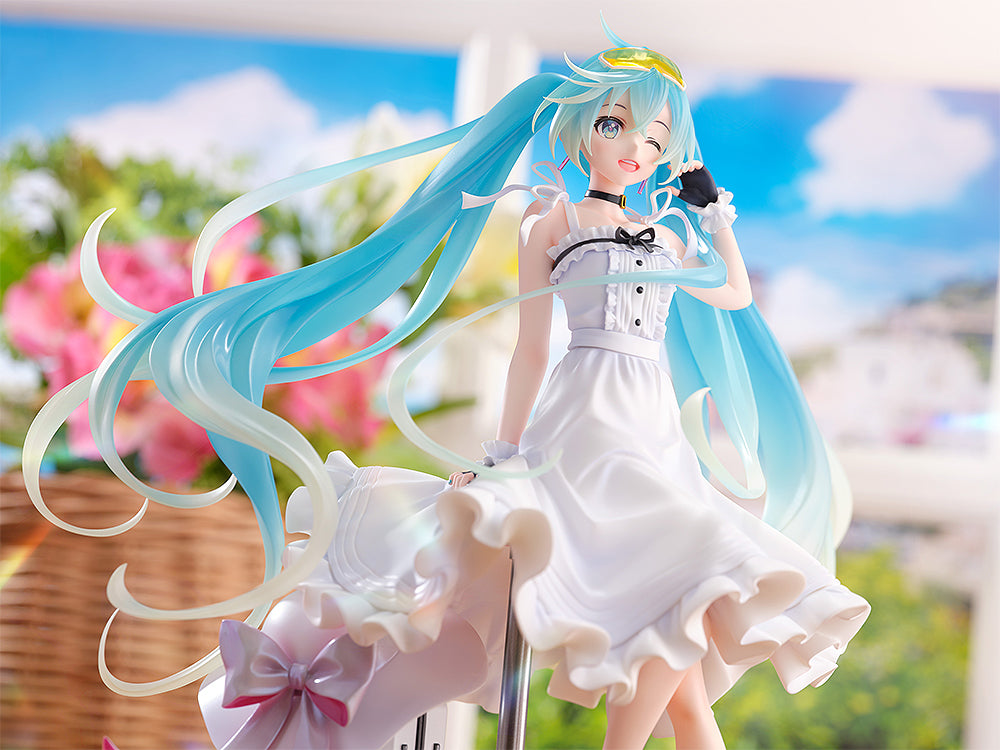 Vocaloid Hatsune Miku GT Project Racing Miku (2021 Vacation Style Ver.) 1/7 Scale Figure featuring Miku in a flowing white dress with dynamic twin-tails, sitting on a stool with a suitcase beside her, capturing a moment of relaxed elegance.