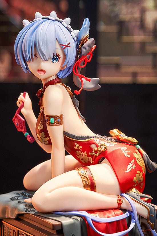 1/7 scale figure of Rem from 'Re:Zero', in a New Year's themed outfit, playfully sitting with a fan next to a 'Maneki Neko', as part of the KD Colle Graceful Beauty series.