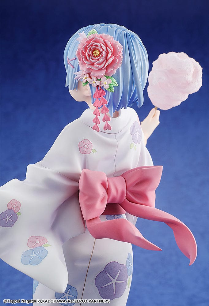 Rem: Yukata Ver. (Renewal Package Edition) figure, featuring Rem in a floral yukata holding cotton candy and a goldfish bag, exuding a cheerful festival vibe.