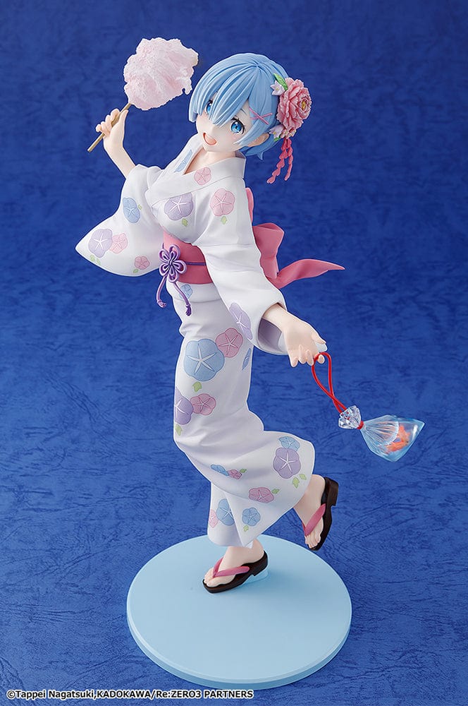 Rem: Yukata Ver. (Renewal Package Edition) figure, featuring Rem in a floral yukata holding cotton candy and a goldfish bag, exuding a cheerful festival vibe.