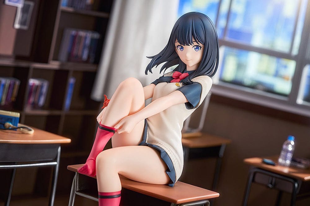 Gridman Universe Rikka Takarada (Daily School Life Ver.) 1/7 Scale Figure seated on school desk in relaxed pose with school uniform and pink socks