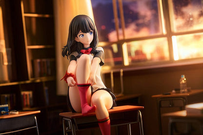 Gridman Universe Rikka Takarada (Daily School Life Ver.) 1/7 Scale Figure seated on school desk in relaxed pose with school uniform and pink socks