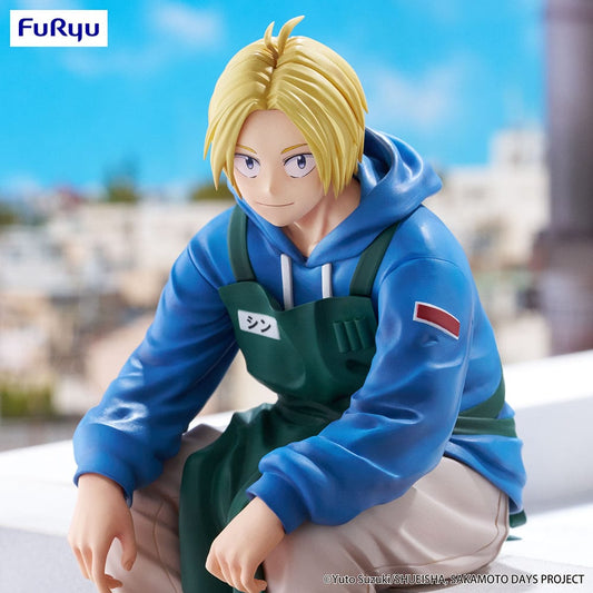 Sakamoto Days Shin Asakura Noodle Stopper Figure – anime figure featuring Shin in a blue hoodie and green apron, sitting casually with a confident expression.