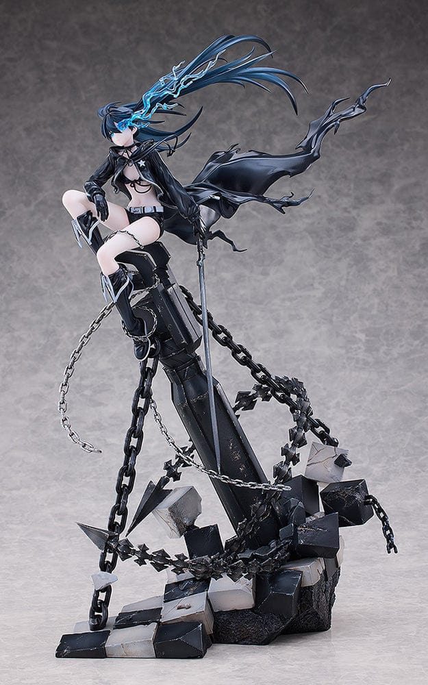 Black Rock Shooter Empress (Pilot Edition Ver.) 1/7 Scale Figure featuring dynamic pose, flowing black coat, blue flame eye, and shattered battlefield base with chains.