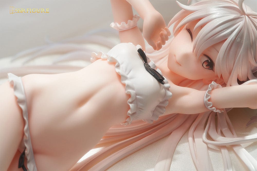 Hayashi Kewi SSR Figure Wakening White Haired-Chan 1/7 Scale Figure lying on a plush bed with flowing white hair and frilly outfit