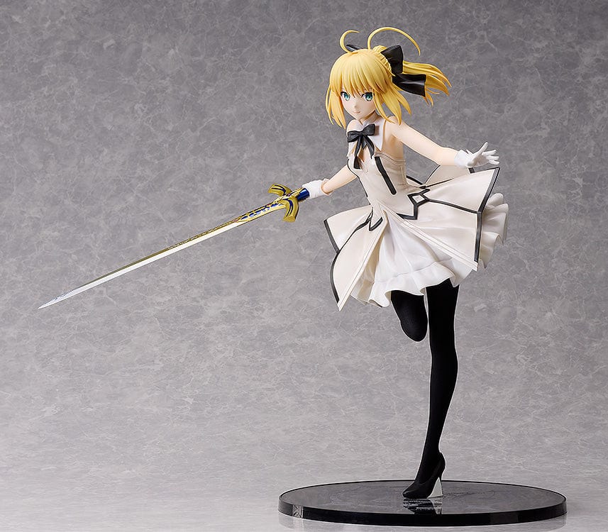 Fate/Grand Order B-Style Saber/Altria Pendragon (Lily) 1/4 Scale Figure in white dress holding a sword.