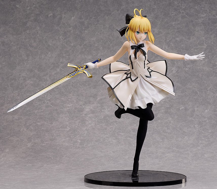 Fate/Grand Order B-Style Saber/Altria Pendragon (Lily) 1/4 Scale Figure in white dress holding a sword.