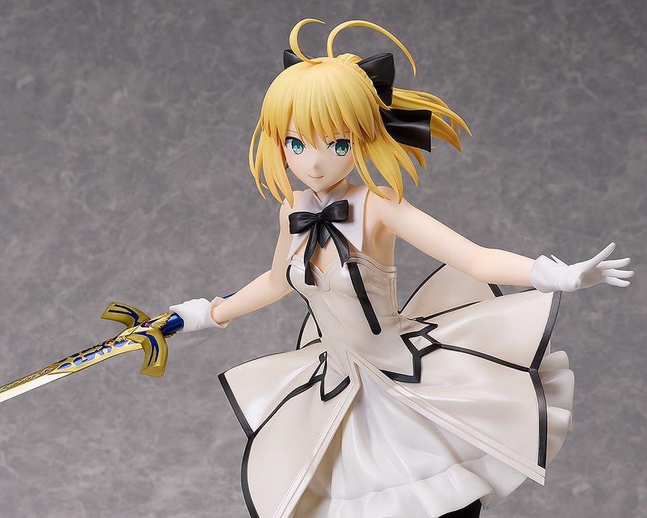 Fate/Grand Order B-Style Saber/Altria Pendragon (Lily) 1/4 Scale Figure in white dress holding a sword.