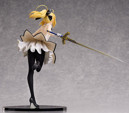 Fate/Grand Order B-Style Saber/Altria Pendragon (Lily) 1/4 Scale Figure in white dress holding a sword.