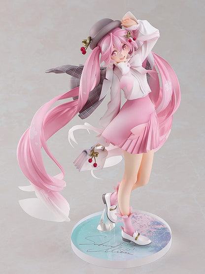 Elegant 1/6 scale figure of Sakura Miku from the Character Vocal Series, in a Hanami cherry blossom viewing outfit. She stands with one hand above her head, long pink twintails decorated with cherry blossom accents, and wears a white blouse with a pink skirt adorned with floral patterns. Miku’s joyful expression and dynamic pose evoke the celebratory spirit of cherry blossom season.