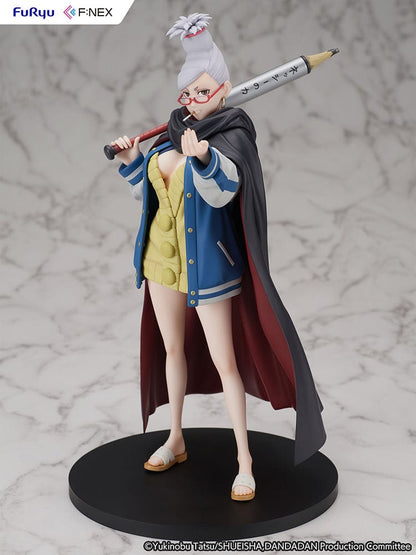 Dandadan Seiko Ayase 1/7 Scale Figure wearing a varsity jacket, yellow sweater dress, and red glasses, wielding a pencil-shaped weapon.