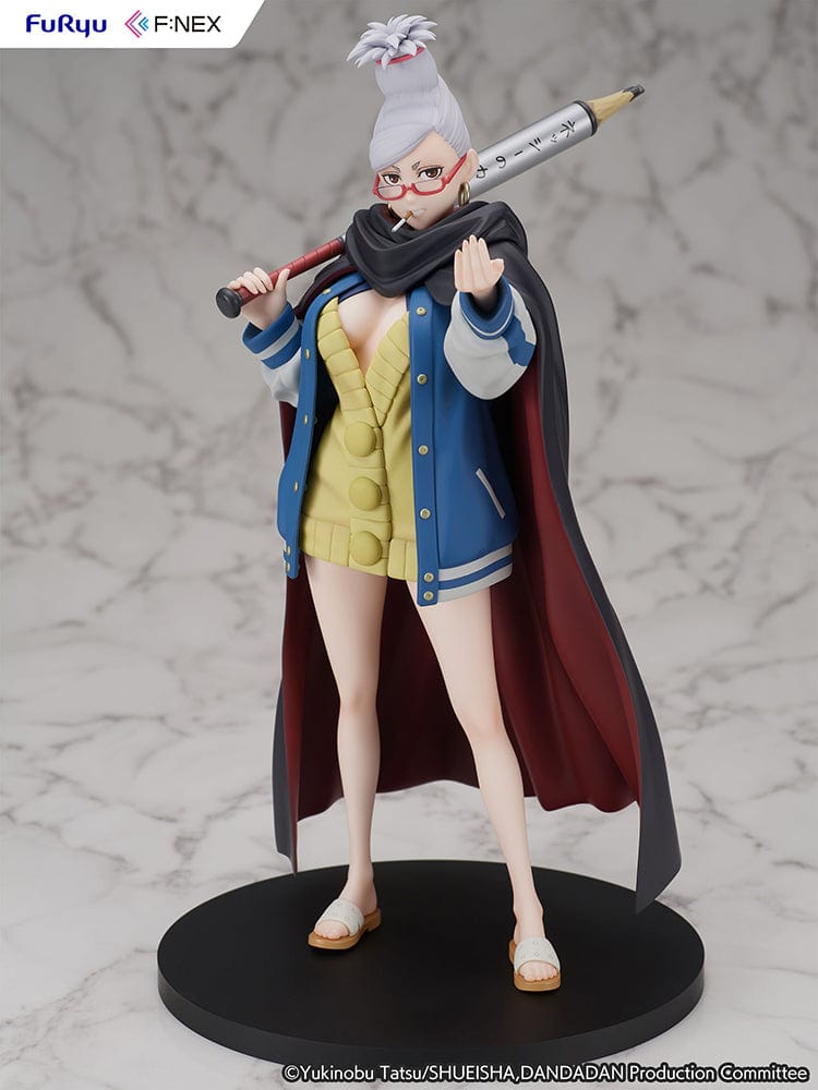 Dandadan Seiko Ayase 1/7 Scale Figure wearing a varsity jacket, yellow sweater dress, and red glasses, wielding a pencil-shaped weapon.