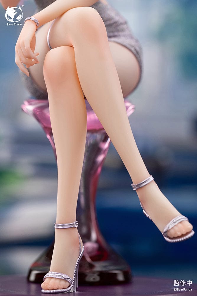 "Serina 1/6 Scale Figure (With Bonus) - Elegant figure of Serina with long white hair, seated gracefully on a stylish chair, wearing a shimmering silver dress and delicate accessories."