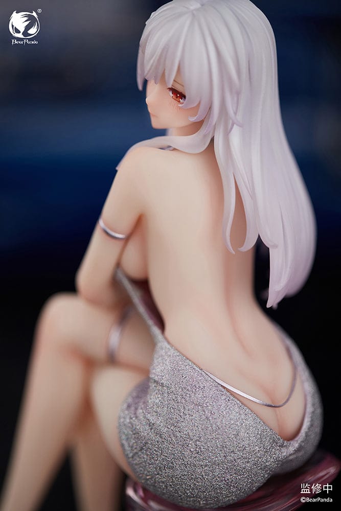 "Serina 1/6 Scale Figure (With Bonus) - Elegant figure of Serina with long white hair, seated gracefully on a stylish chair, wearing a shimmering silver dress and delicate accessories."