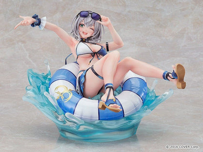 Hololive Production Shirogane Noel (Swimsuit Ver.) 1/7 Scale Figure lounging on float ring with water splash effects, in playful beach pose