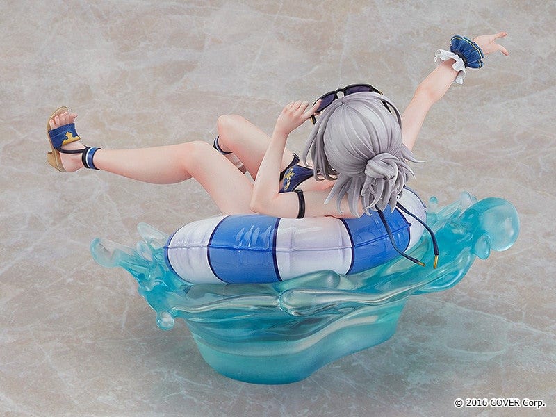 Hololive Production Shirogane Noel (Swimsuit Ver.) 1/7 Scale Figure lounging on float ring with water splash effects, in playful beach pose