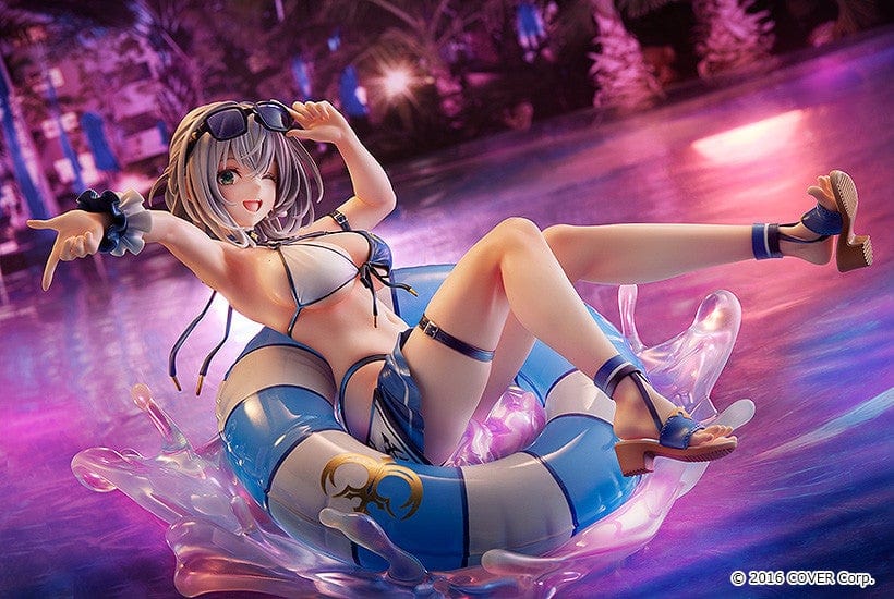 Hololive Production Shirogane Noel (Swimsuit Ver.) 1/7 Scale Figure lounging on float ring with water splash effects, in playful beach pose