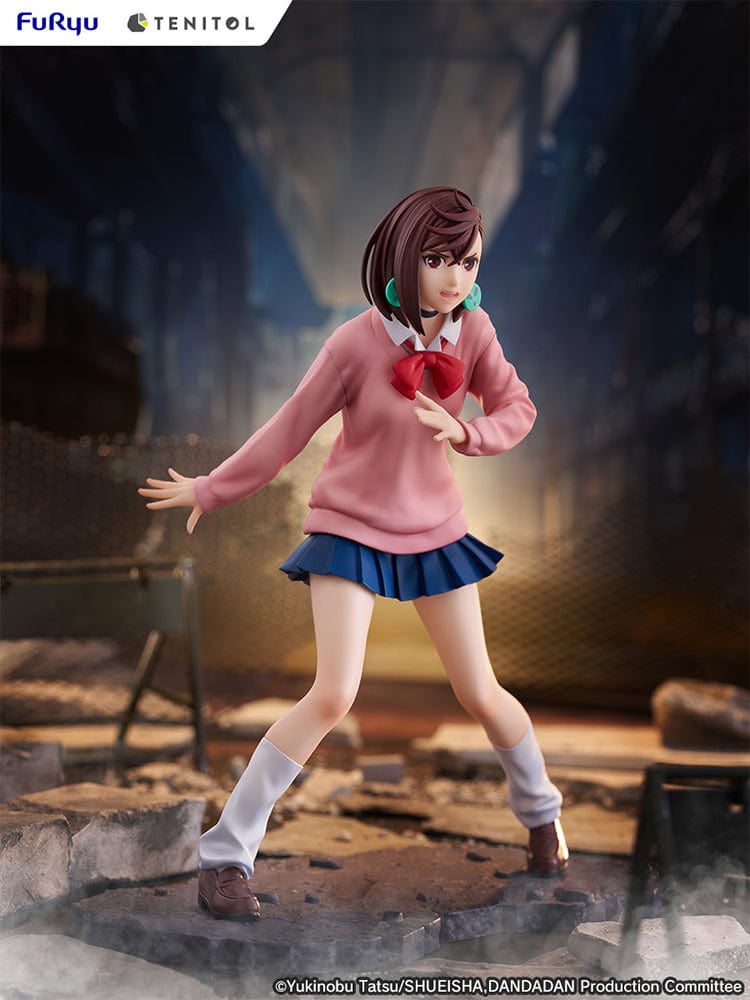 Dandadan Tenitol Momo Ayase Figure in school uniform with pink sweater and red ribbon, standing in action pose on rugged base.