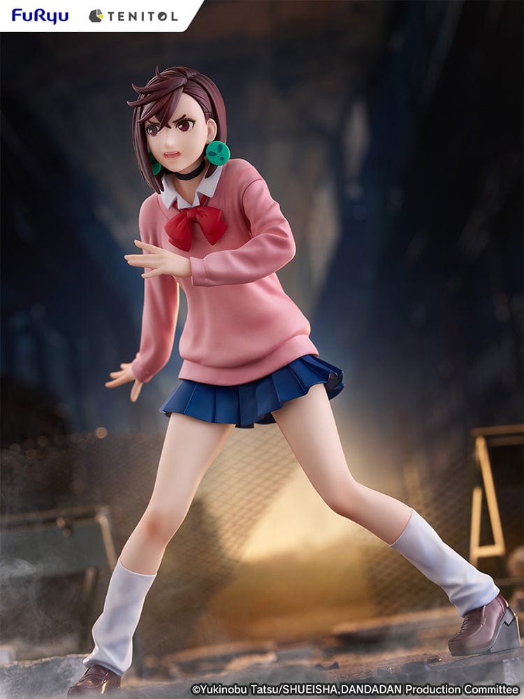 Dandadan Tenitol Momo Ayase Figure in school uniform with pink sweater and red ribbon, standing in action pose on rugged base.