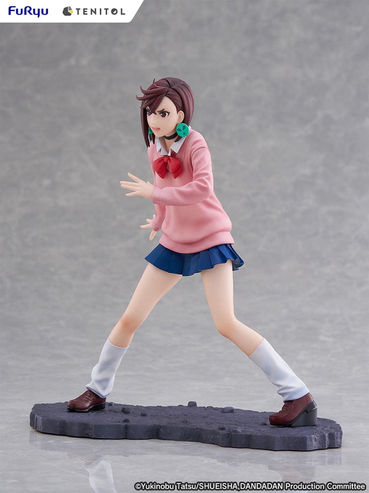 Dandadan Tenitol Momo Ayase Figure in school uniform with pink sweater and red ribbon, standing in action pose on rugged base.