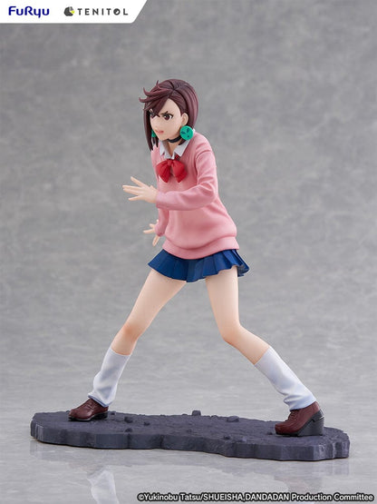 Dandadan Tenitol Momo Ayase Figure in school uniform with pink sweater and red ribbon, standing in action pose on rugged base.