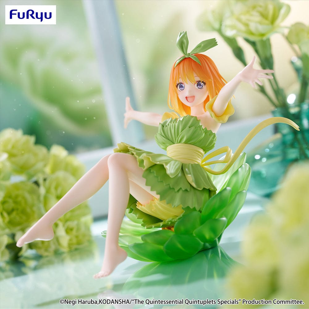 The Quintessential Quintuplets Bloo-me! Yotsuba Nakano Figure, featuring Yotsuba in a vibrant green leafy dress with a dynamic reclining pose, exuding cheerful energy and intricate detailing.