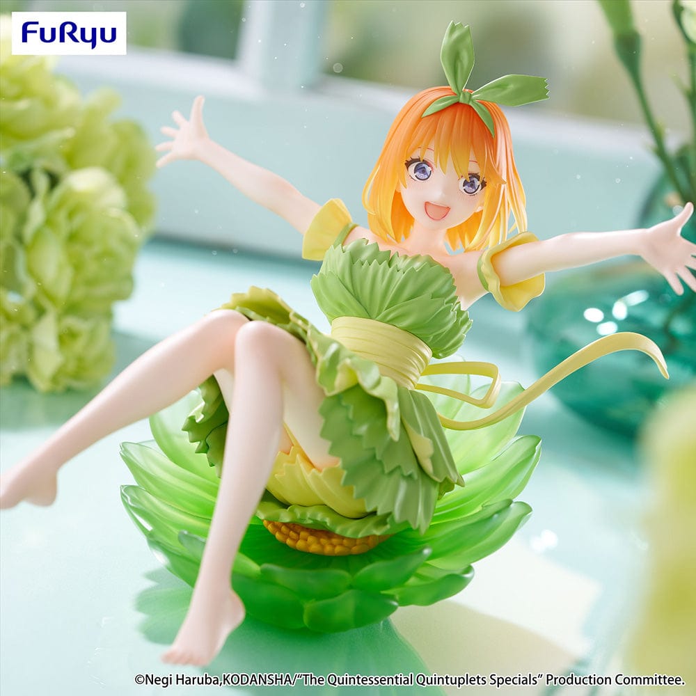 The Quintessential Quintuplets Bloo-me! Yotsuba Nakano Figure, featuring Yotsuba in a vibrant green leafy dress with a dynamic reclining pose, exuding cheerful energy and intricate detailing.