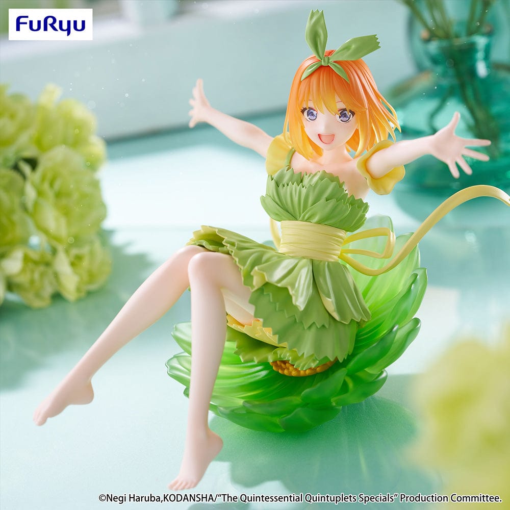 The Quintessential Quintuplets Bloo-me! Yotsuba Nakano Figure, featuring Yotsuba in a vibrant green leafy dress with a dynamic reclining pose, exuding cheerful energy and intricate detailing.