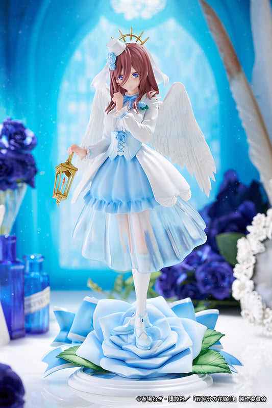 The Quintessential Quintuplets Miku Nakano (Angel Ver.) 1/7 Scale Figure, featuring Miku in an angelic outfit with delicate wings, standing on a blue rose base.