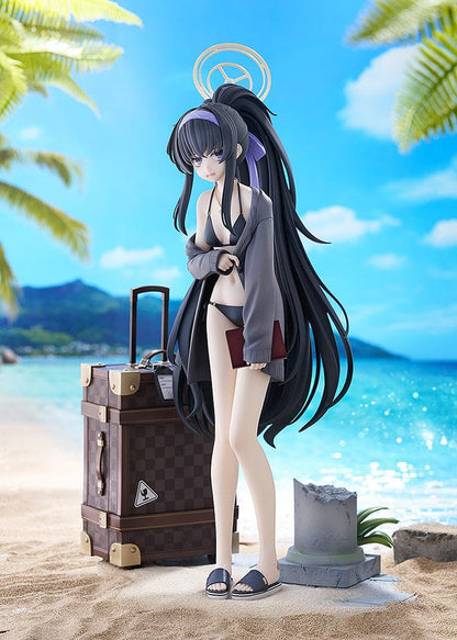 Blue Archive Ui (Swimsuit) 1/7 Scale Figure featuring Ui in a black swimsuit with an oversized jacket, long black hair, and detailed beach base with suitcase and stone pillar.