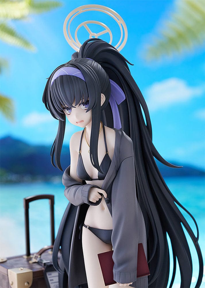 Blue Archive Ui (Swimsuit) 1/7 Scale Figure featuring Ui in a black swimsuit with an oversized jacket, long black hair, and detailed beach base with suitcase and stone pillar.