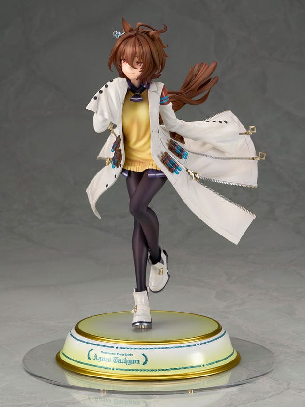 Uma Musume Pretty Derby Agnes Tachyon 1/7 Scale Figure with white lab coat and yellow sweater, standing on a gold-edged base.