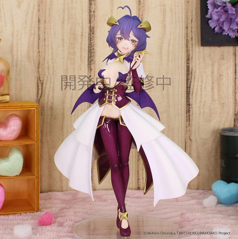 Gushing Over Magical Girls Magia Baiser Vivit figure in a dynamic pose with a purple and gold outfit, detailed with star motifs and flowing cape.