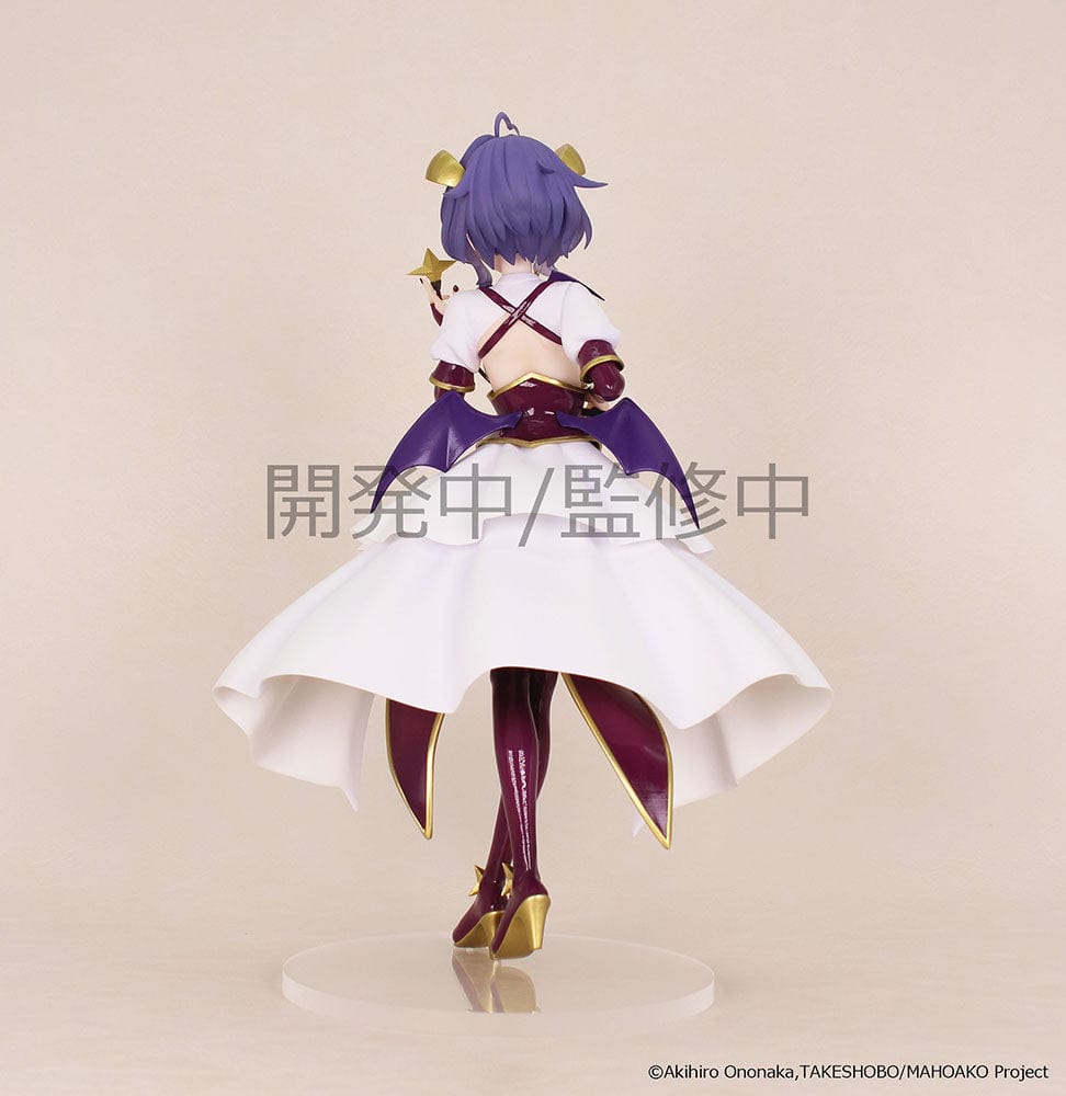 Gushing Over Magical Girls Magia Baiser Vivit figure in a dynamic pose with a purple and gold outfit, detailed with star motifs and flowing cape.