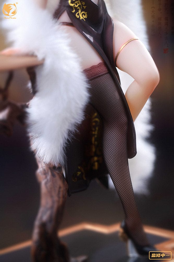 You Feng Lai Yi 1/6 Scale Figure featuring an elegant character in a black cheongsam with gold embroidery, sheer stockings, and a fur stole, posed gracefully on a display base with a bonsai tree and a red vase.