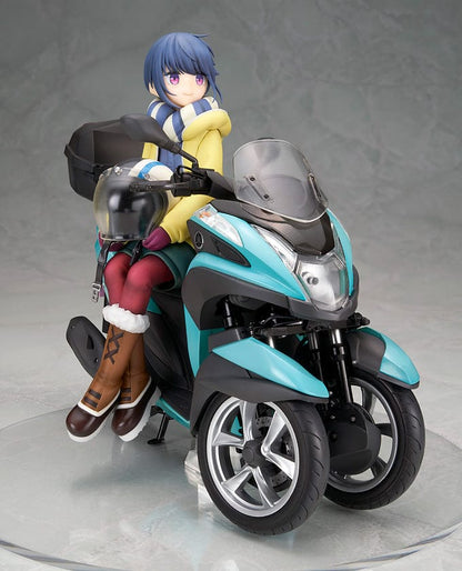 Laid-Back Camp Rin Shima 1/10 Scale Figure seated on a detailed turquoise three-wheeled scooter, wearing winter camping gear with a scarf and boots.