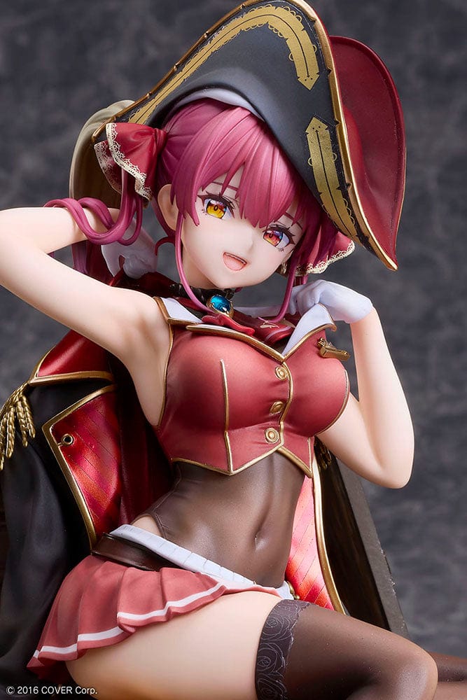 Hololive Production Houshou Marine 1/7 Scale Figure featuring the pirate captain lounging atop a treasure chest filled with gold coins, dressed in her signature pirate attire, set against a white background.