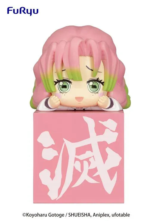 Demon Slayer Hikkake Hashira 1 Mitsuri Kanroji chibi figure resting on a pink display block with the Demon Slayer Corps emblem.