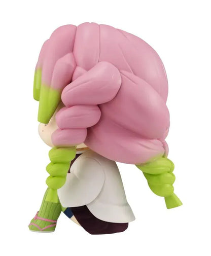 Demon Slayer Mitsuri Kanroji Look Up figure seated in her Corps uniform and white haori with pink-and-green braided hair.